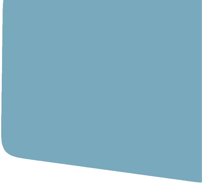 Stephan Trippl steht seitlich und streckt die Hand aus in die Richtung einer nicht sichtbaren Person